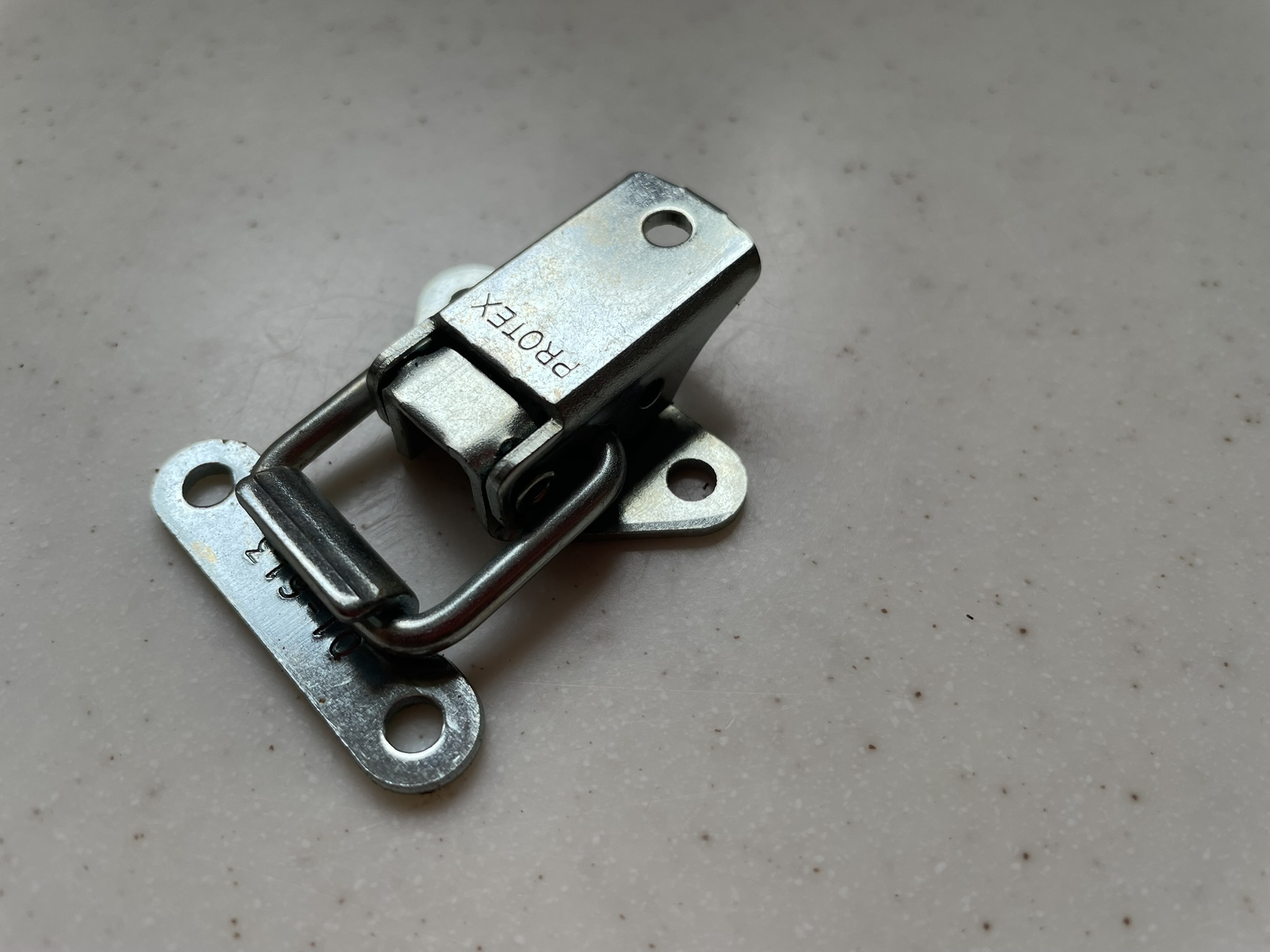 A Pair of Toggle Fasteners by E.H.Thorne