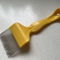 Plastic Cranked Uncapping Fork