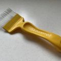Plastic Cranked Uncapping Fork